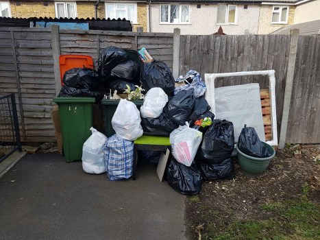 Professional team preparing to remove a sofa in Kentish Town