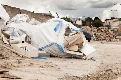 Professionals removing a sofa in Colindale