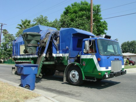 Waste collection truck operating in North West London